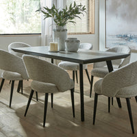 The Nivara Industrial Black Dining Table