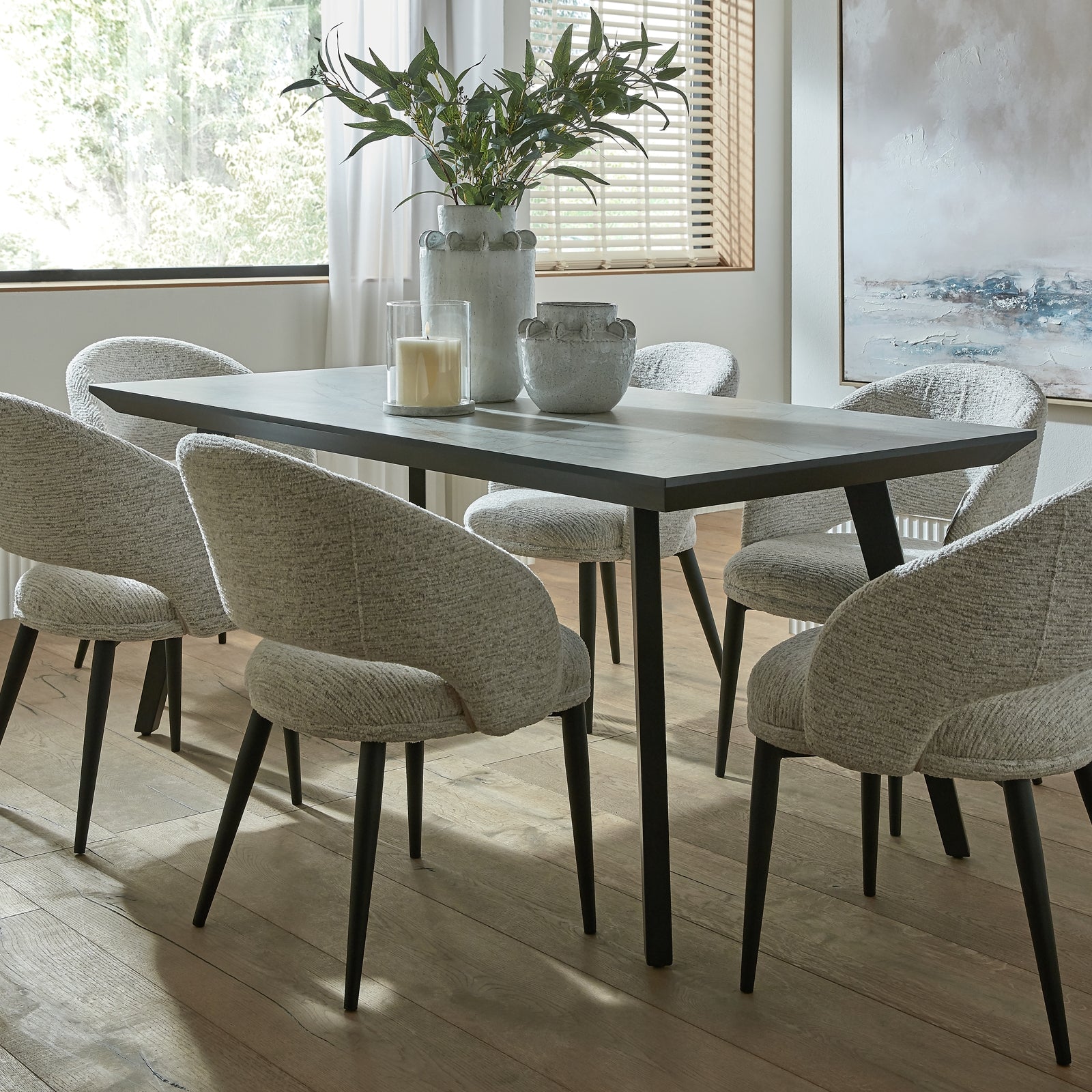 The Nivara Industrial Black Dining Table